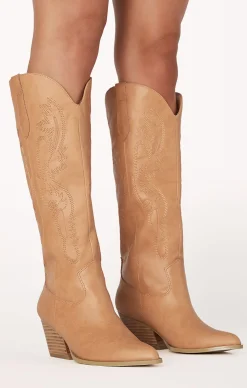 Show Me Your Mumu Billini Zeina Cowboy Boot                        Billini Zeina Cowboy Boot                                  $120                                                                                                                                                                                                                                                                                                                                                                                                                                                                                                                                                                                                                                                                                                                                                                                                                                                                                                                                                                                                                                                                                                                                                                                                                                                                                                                                                                                                                                                                                                                                                                                                                                                                                                                                                                                                                                                                                                                      Complete the Look                                                              Add to wishlist                                            Lack of Color Raffia Cowboy Hat       Natural              $80                                                                                            Add to wishlist                                            Outlaw Dress       Pearly White              $164                                                                                            Add to wishlist                                            Agnes Woven Bag       Beige               $56                                                                                            Add to wishlist                                            Jackie Mack Jess Earrings       Gold              $38                                                                                    Billini Zeina Cowboy Boot                                          $120                                                                                                                                        6                          7                          8                          9                          10                                                      Size                                                      6                                                  7                                                  8                                                  9                                                  10                                                                                        Color          Camel                            Size Size Guide                      6              7              8              9              10                                                                      Runs Small    True to Size    Runs Large            .product-callout__text--promo {          }                                 Add To Cart