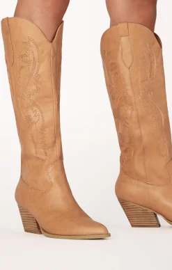 Show Me Your Mumu Billini Zeina Cowboy Boot                        Billini Zeina Cowboy Boot                                  $120                                                                                                                                                                                                                                                                                                                                                                                                                                                                                                                                                                                                                                                                                                                                                                                                                                                                                                                                                                                                                                                                                                                                                                                                                                                                                                                                                                                                                                                                                                                                                                                                                                                                                                                                                                                                                                                                                                                      Complete the Look                                                              Add to wishlist                                            Lack of Color Raffia Cowboy Hat       Natural              $80                                                                                            Add to wishlist                                            Outlaw Dress       Pearly White              $164                                                                                            Add to wishlist                                            Agnes Woven Bag       Beige               $56                                                                                            Add to wishlist                                            Jackie Mack Jess Earrings       Gold              $38                                                                                    Billini Zeina Cowboy Boot                                          $120                                                                                                                                        6                          7                          8                          9                          10                                                      Size                                                      6                                                  7                                                  8                                                  9                                                  10                                                                                        Color          Camel                            Size Size Guide                      6              7              8              9              10                                                                      Runs Small    True to Size    Runs Large            .product-callout__text--promo {          }                                 Add To Cart
